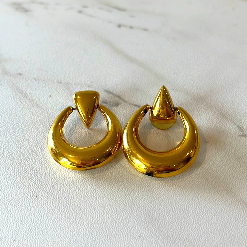 Monet gold tone shiny door knocker earrings